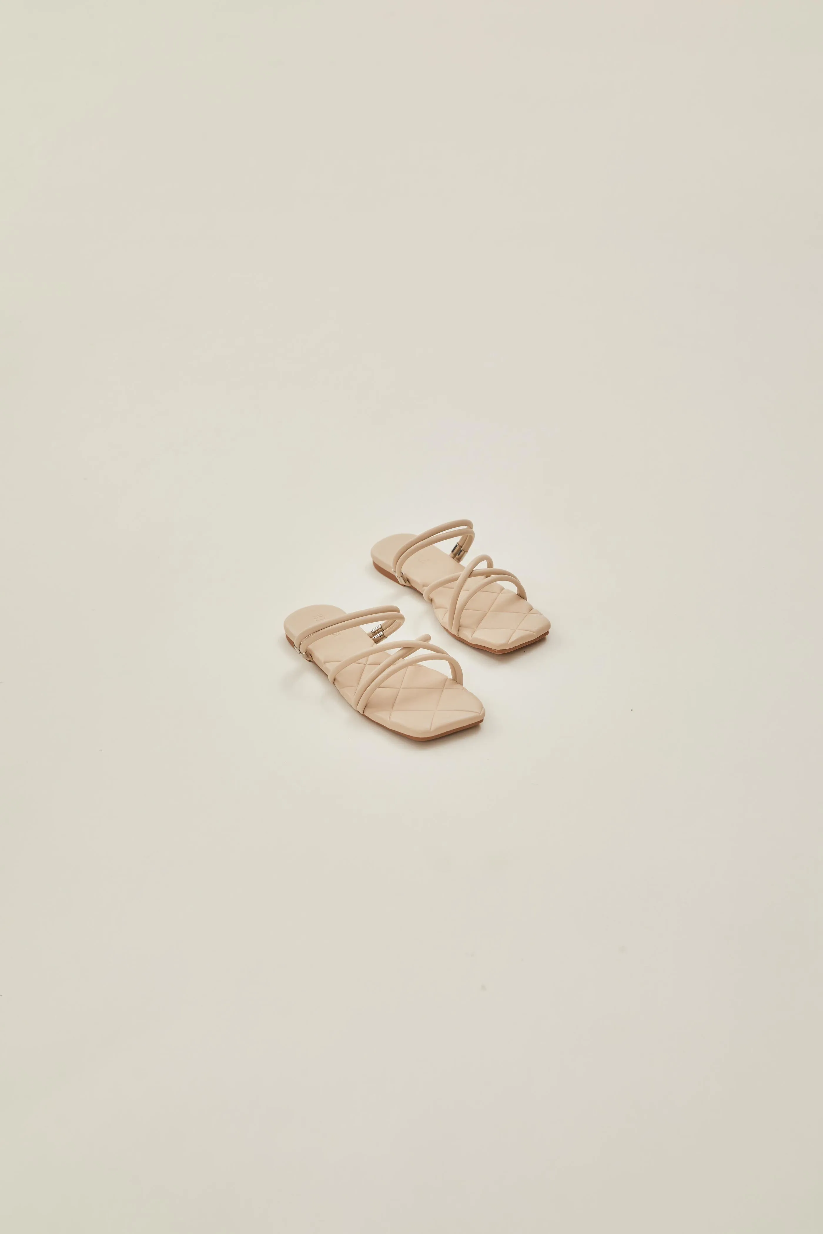 Lea Cross Sandals in Cream